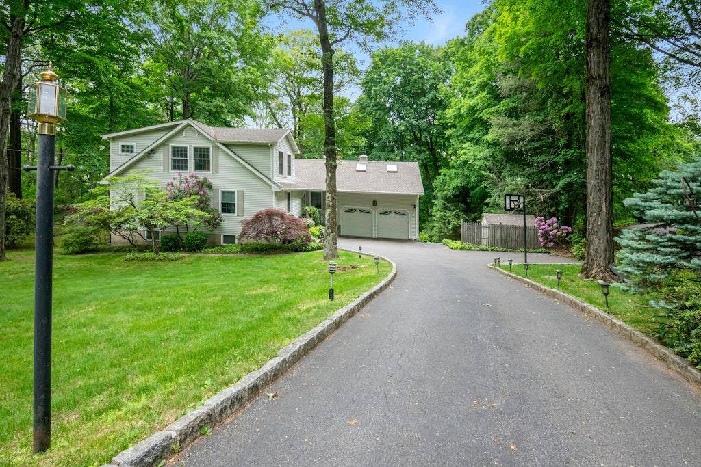 Welcome to 26 Mayberry Road, a charming and spacious 5 bedroom expanded ranch style home on a quiet cul de sac street in the Chappaqua school district.