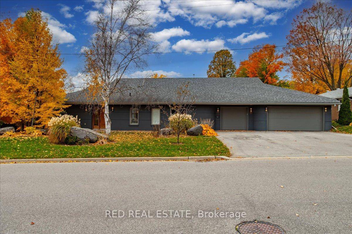 Unique Custom Sprawling Modern Bungalow with Inground Pool, and triple car garage ideally located in Barrie's East Ends Exclusive Area of Fine Homes situated on a 110ft x 185ft lot.