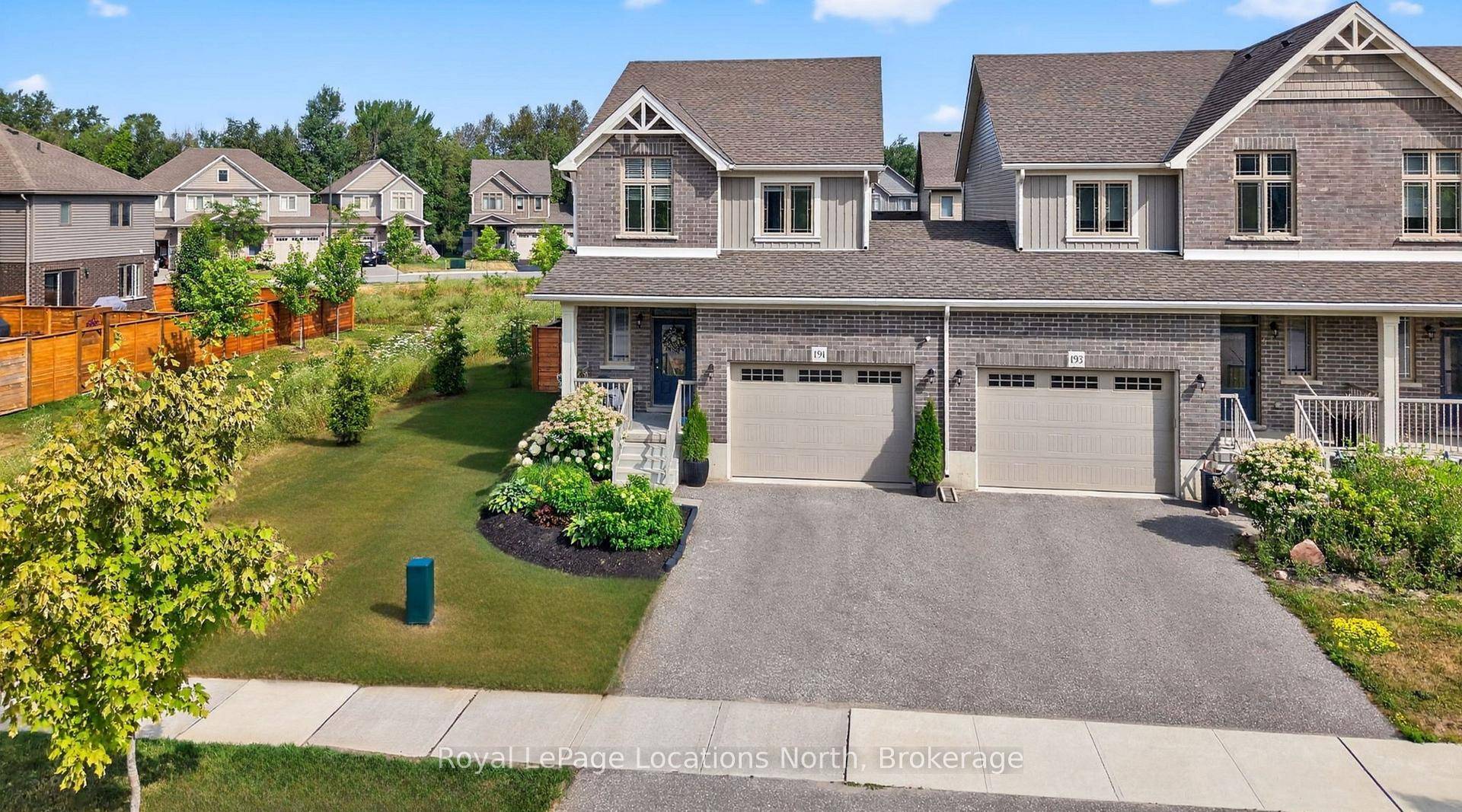 Welcome to 191 Collins Street, a stunning freehold end unit townhome in the coveted Lockhaven neighbourhood that truly lives like a detached home.