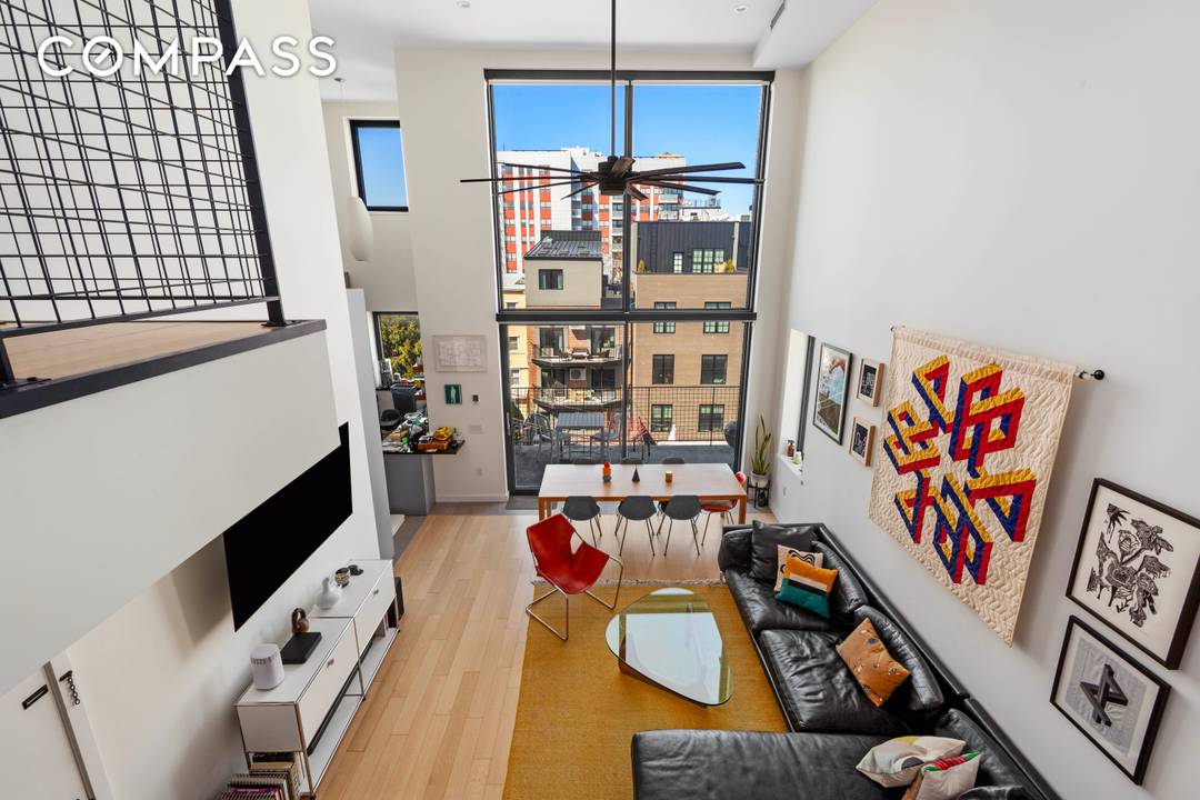 The penthouse at 33 Conselyea Street is a rare floor through duplex residence offering dramatic scale, privacy, and multiple outdoor spaces within a boutique five unit condominium.