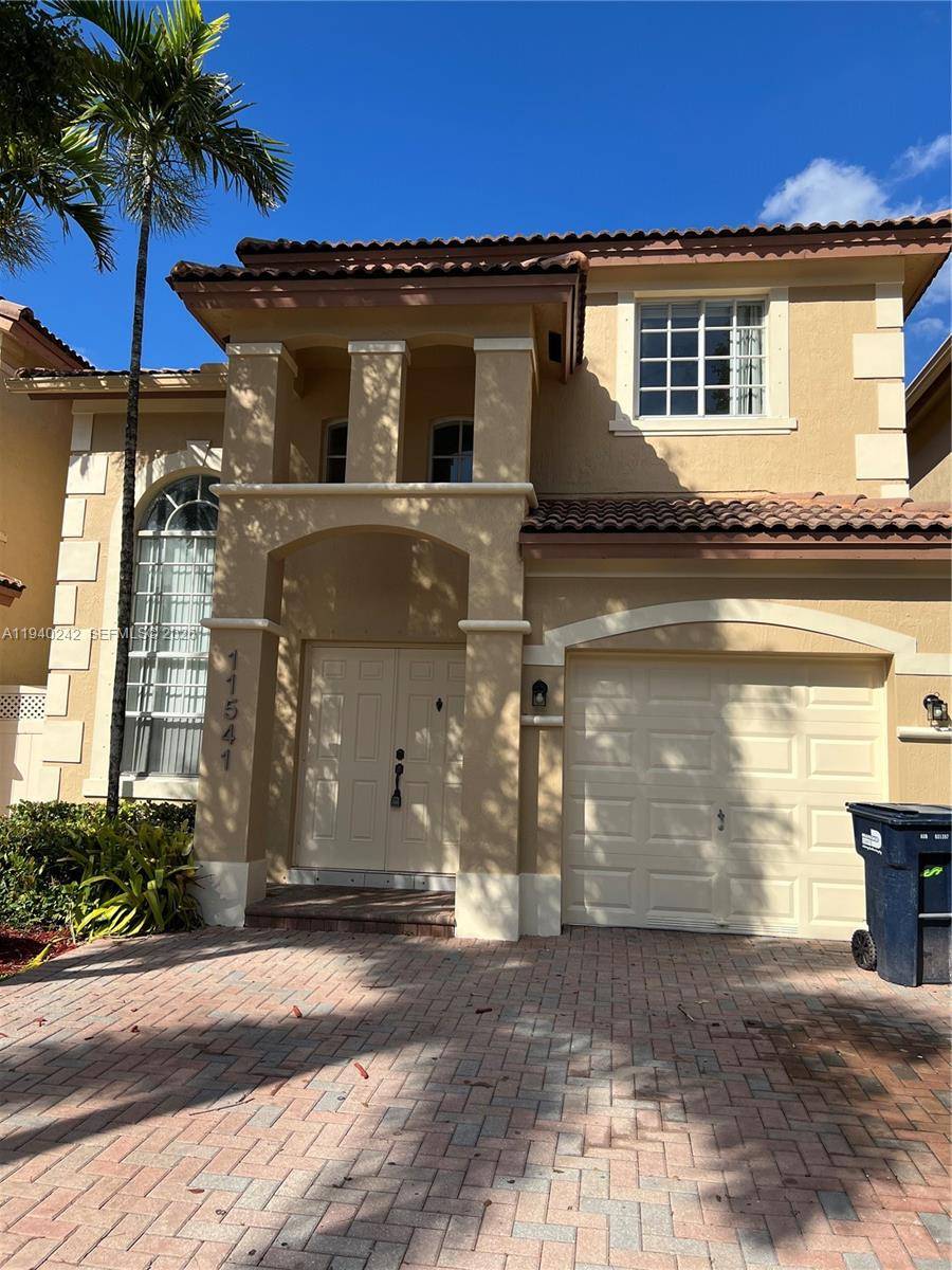 Spectacular lakefront home in a gated community in Doral with one of the lowest HOA fees in the area.