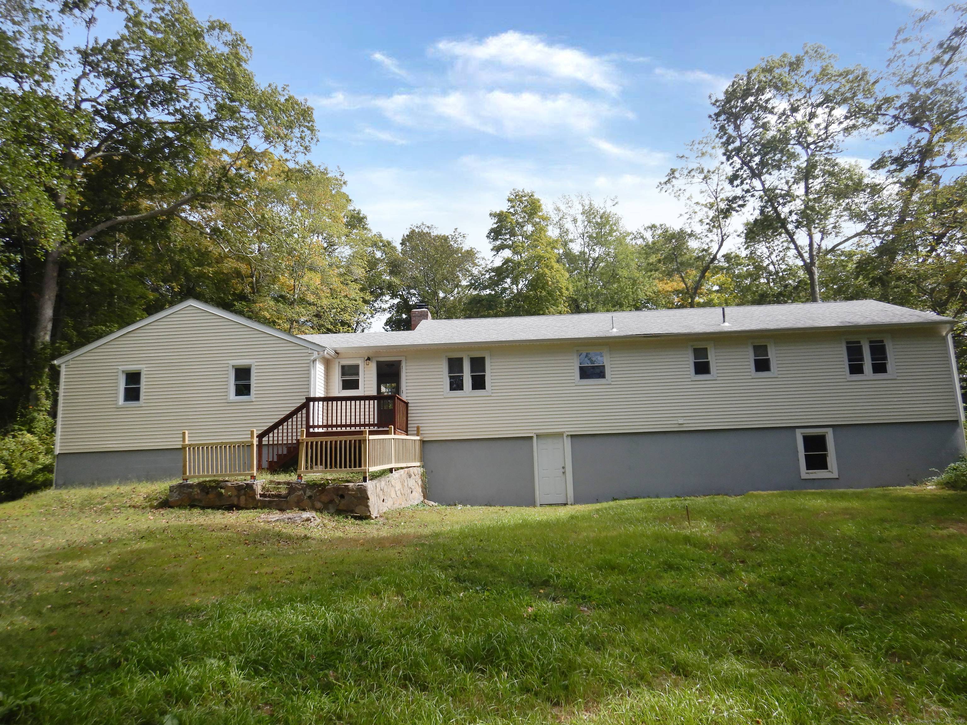Ranch style home located on a corner lot with a generous sized backyard.