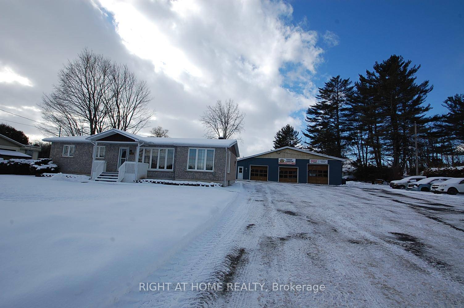 Great opportunity, an Automotive Mechanic Garage in Business for more than 50 years, includes a 3 bedroom bungalow recently repainted and just became vacant.