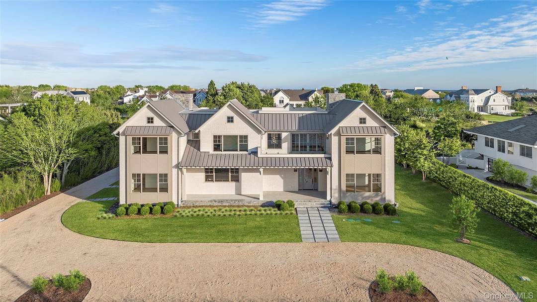 Deep water dock highlights this exceptional new construction waterfront estate offering over 8, 500 square feet of fully custom craftsmanship with sweeping water views throughout.