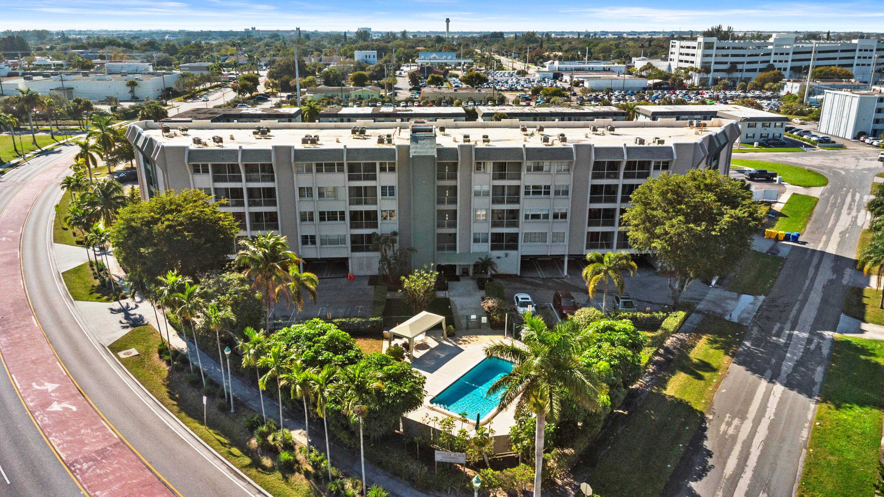 Cozy 638 sq ft one bedroom, one bath condo on second floor of Spencer Place with balcony overlooking the pool nice city view.