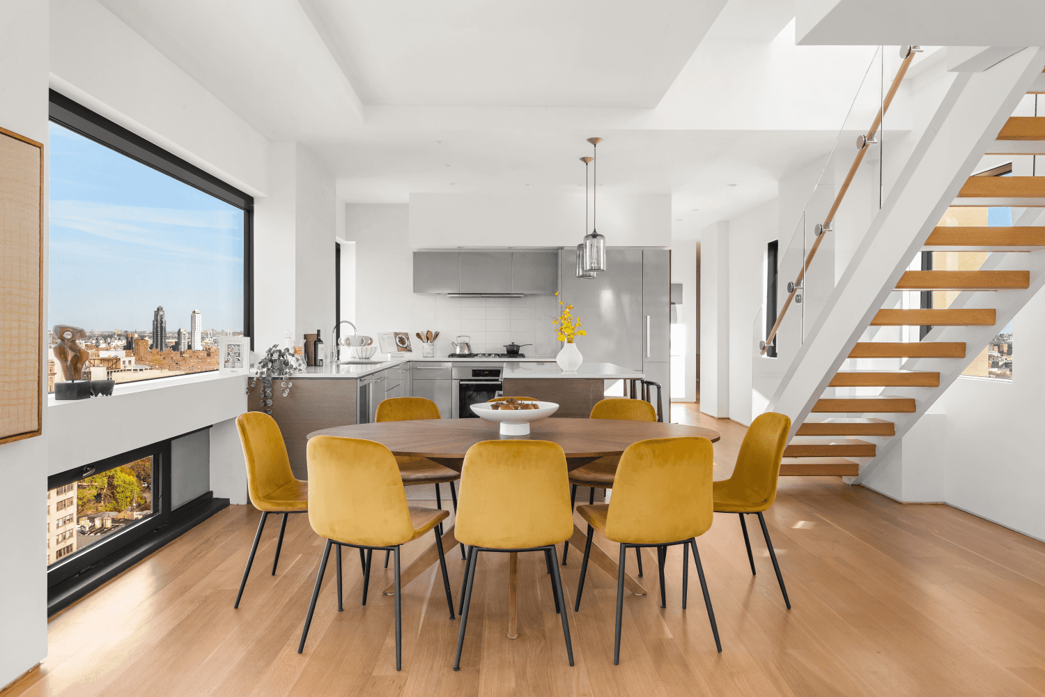 Welcome to this top floor duplex penthouse with three terraces, a solarium, and breathtaking 360 degree views of the Midtown and Downtown Skylines.