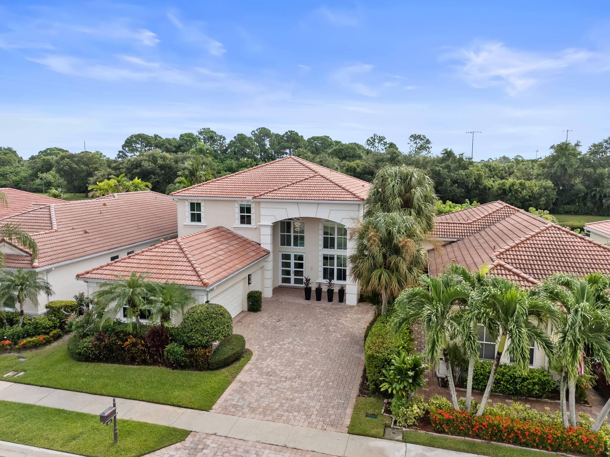 This exceptional home offers 4 bedrooms, 3.