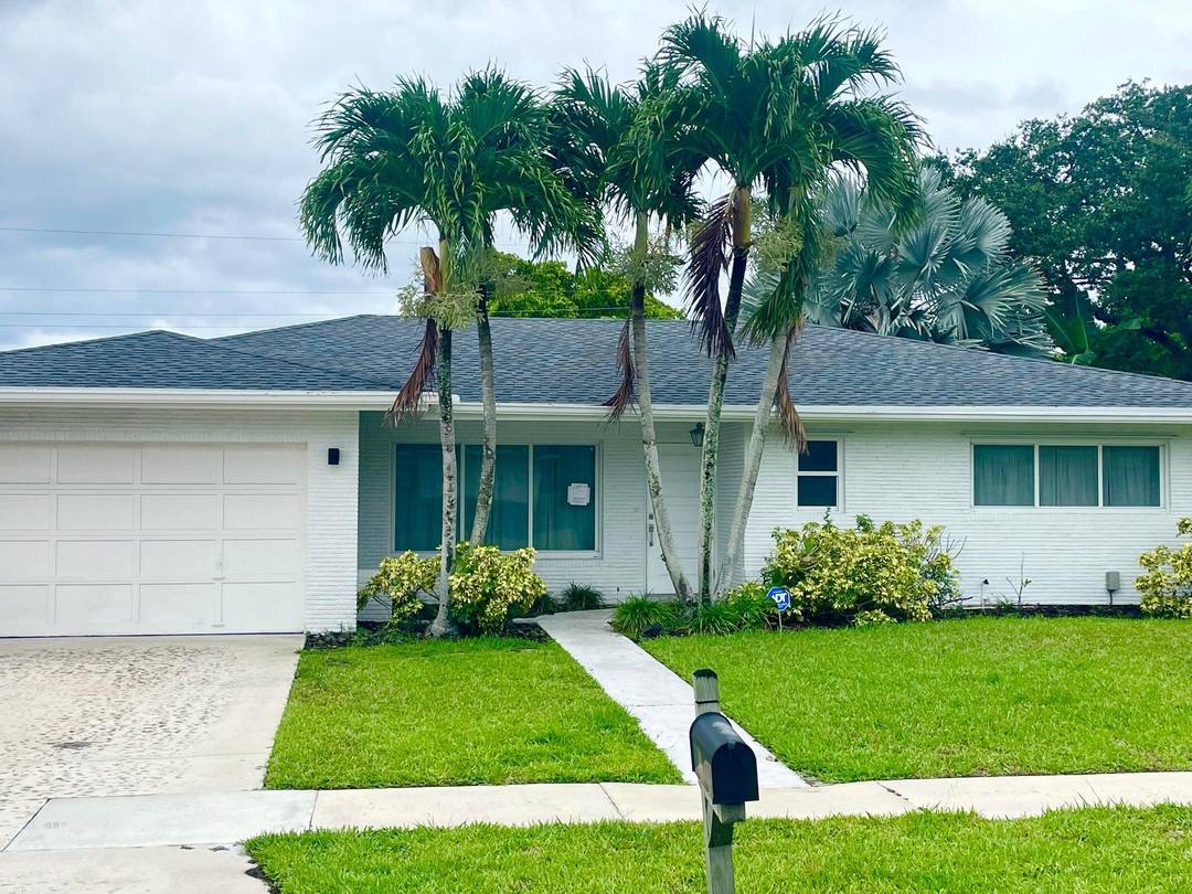 Discover luxurious South Florida living in this stunning ranch home, perfectly situated in the heart of Boca Raton.