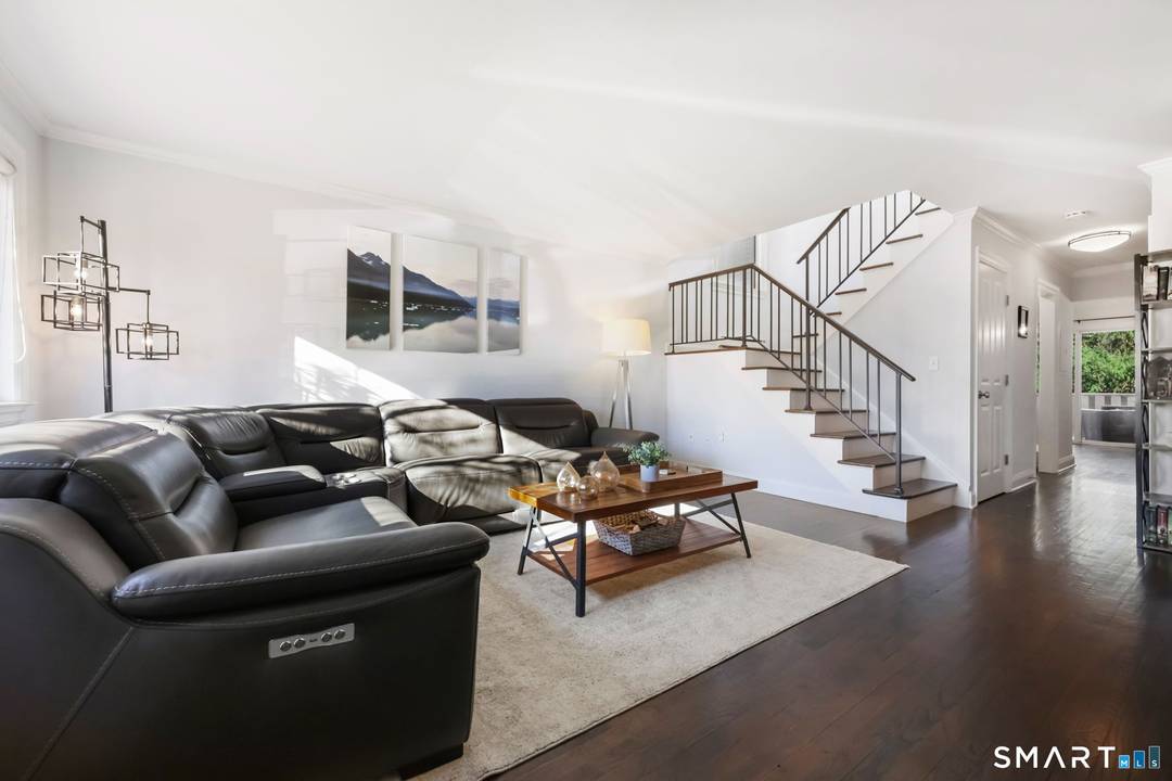 Welcome to 168 Belltown Road, Unit 31 an updated, modern end unit townhouse tucked privately at the back of the complex.