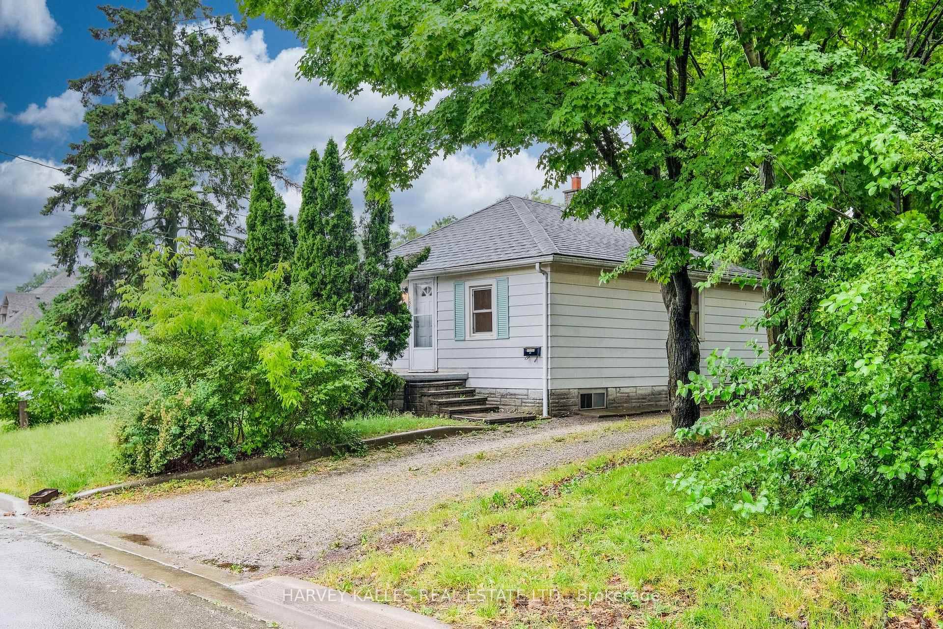 Welcome to this Updated detached 2 bedroom home with separate entrance to basement, 3 car garage perfect for additional storage plus private drive with 4 additional parking.