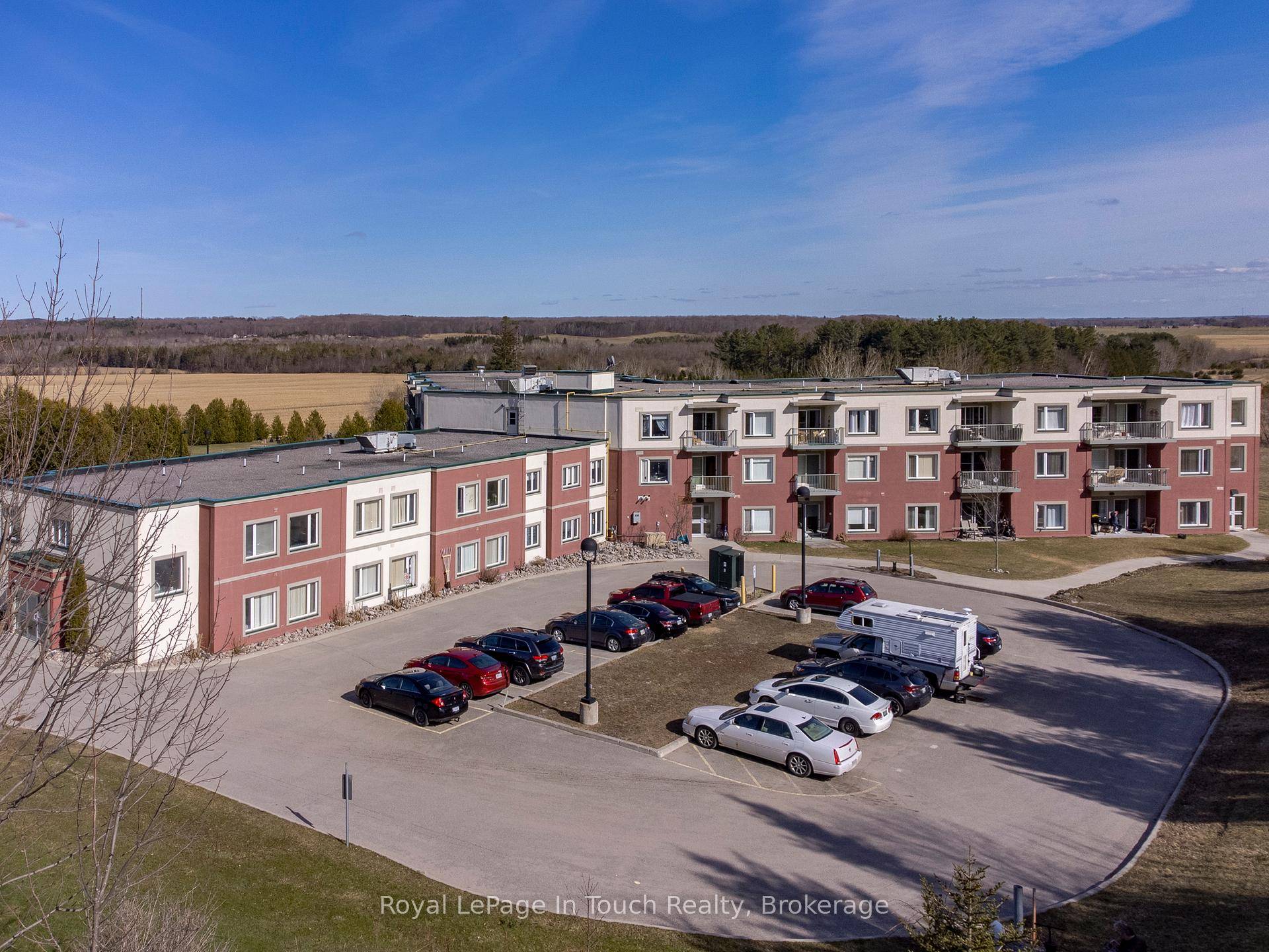 Welcome to Unit 310 at The Villageois near Georgian Bay in Tiny Township, a peaceful retreat in the countryside.