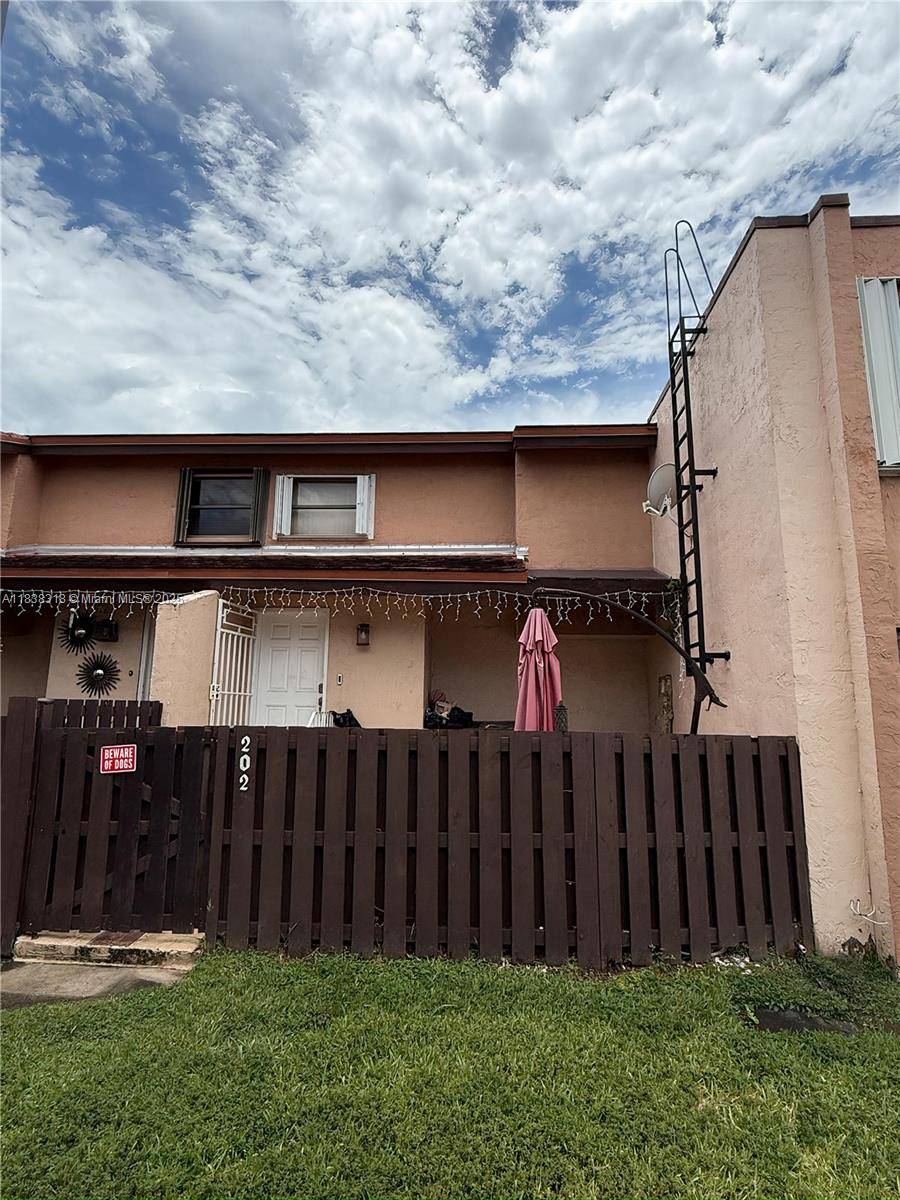 Welcome to this beautifully maintained 2 bedroom, 2 bath townhouse style condo in the heart of Fontainebleau.