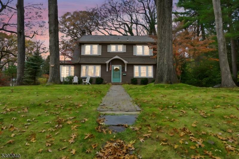 Positioned on nearly half an acre in Park Section of Boonton, this thoughtfully updated Colonial offers a seamless blend of 1920s craftsmanship and modern functionality.