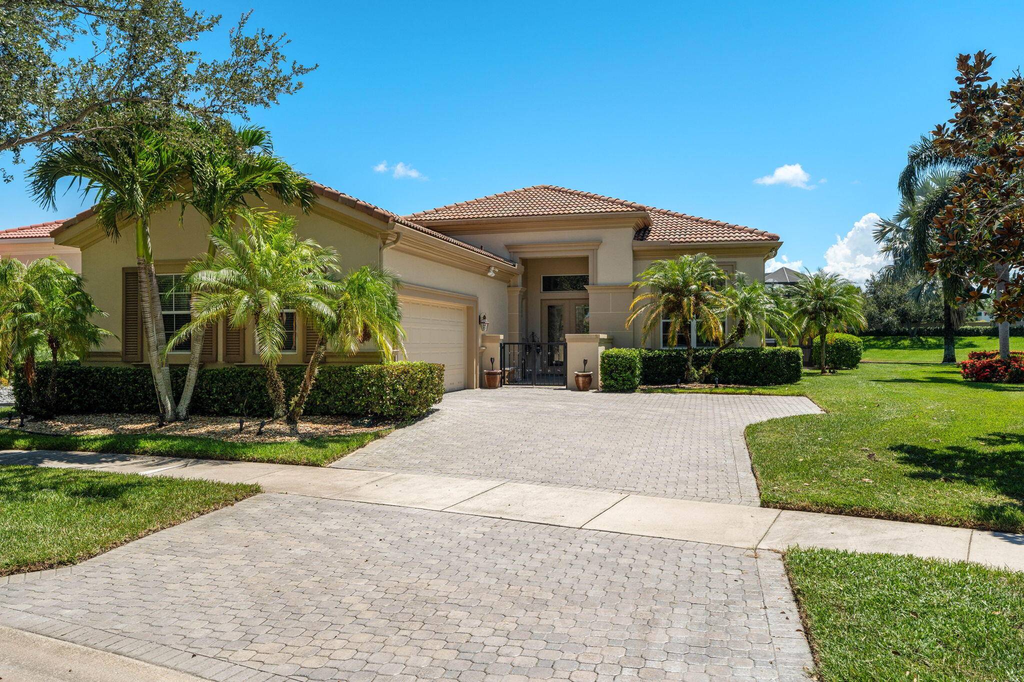 Stunning home in VERANO with spectacular lake views and unique courtyard entrance !