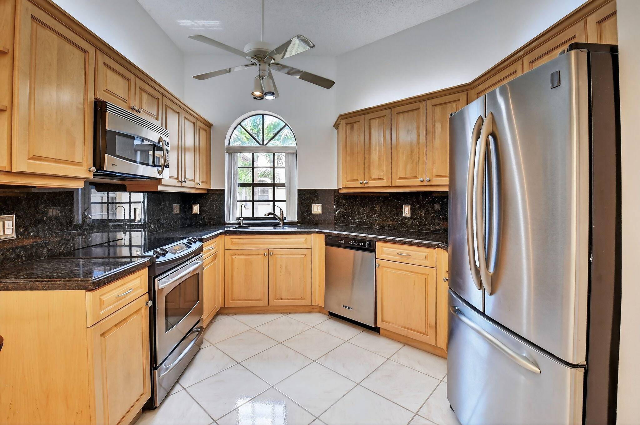 This Grandi model condo boasts its own private elevator and private staircase just inside the front door.