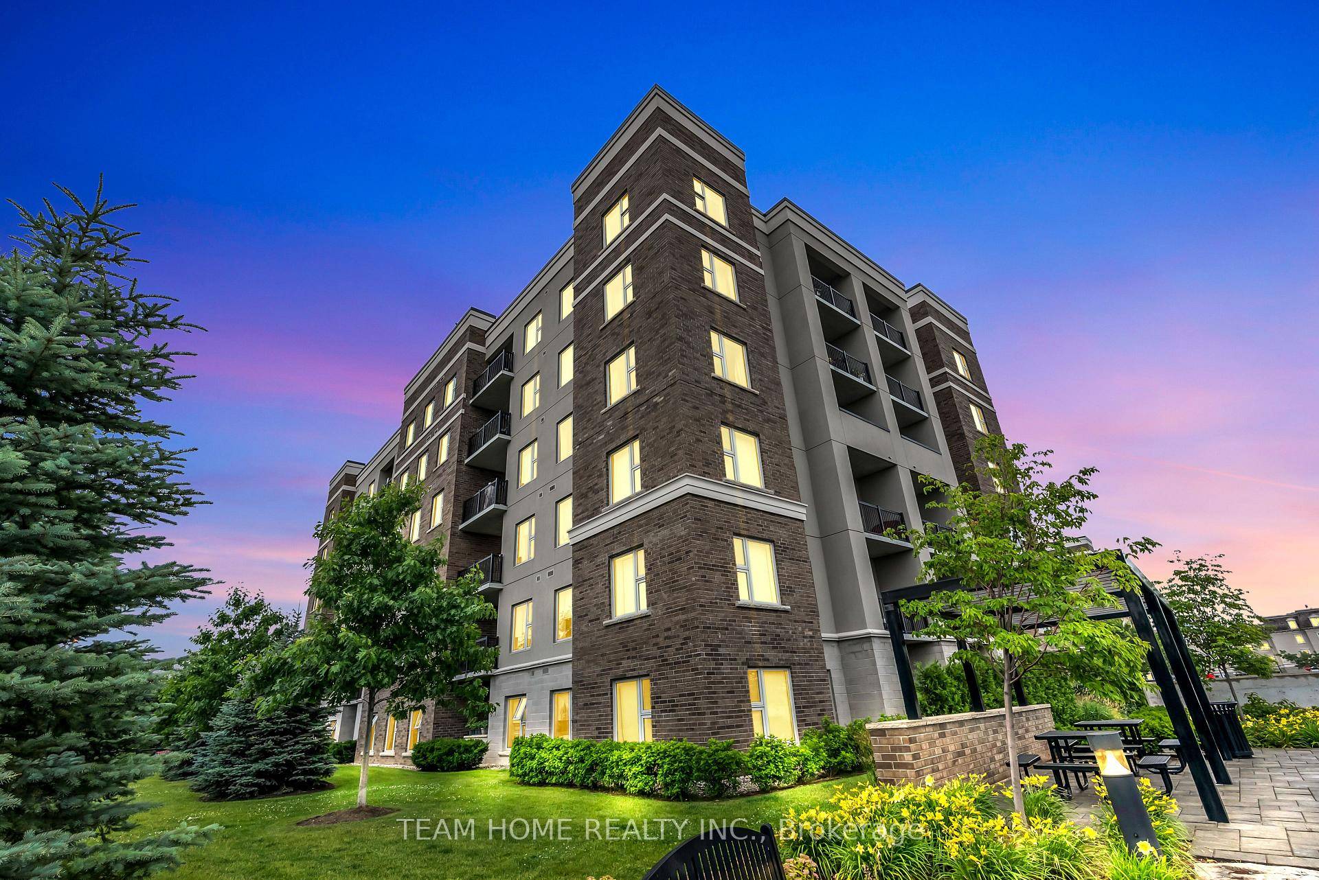 This condominium features open concept kitchen, large living area, 9 ft.