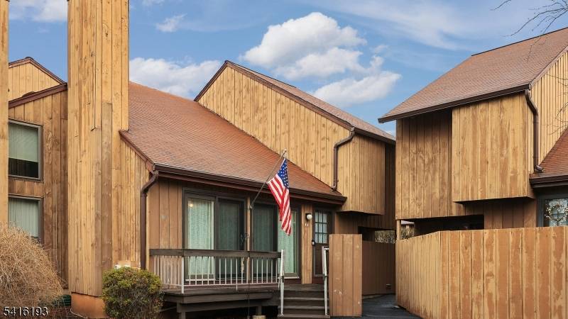 WELCOME HOME to this impeccably maintained 2 bedroom end unit townhome with basement and garage.