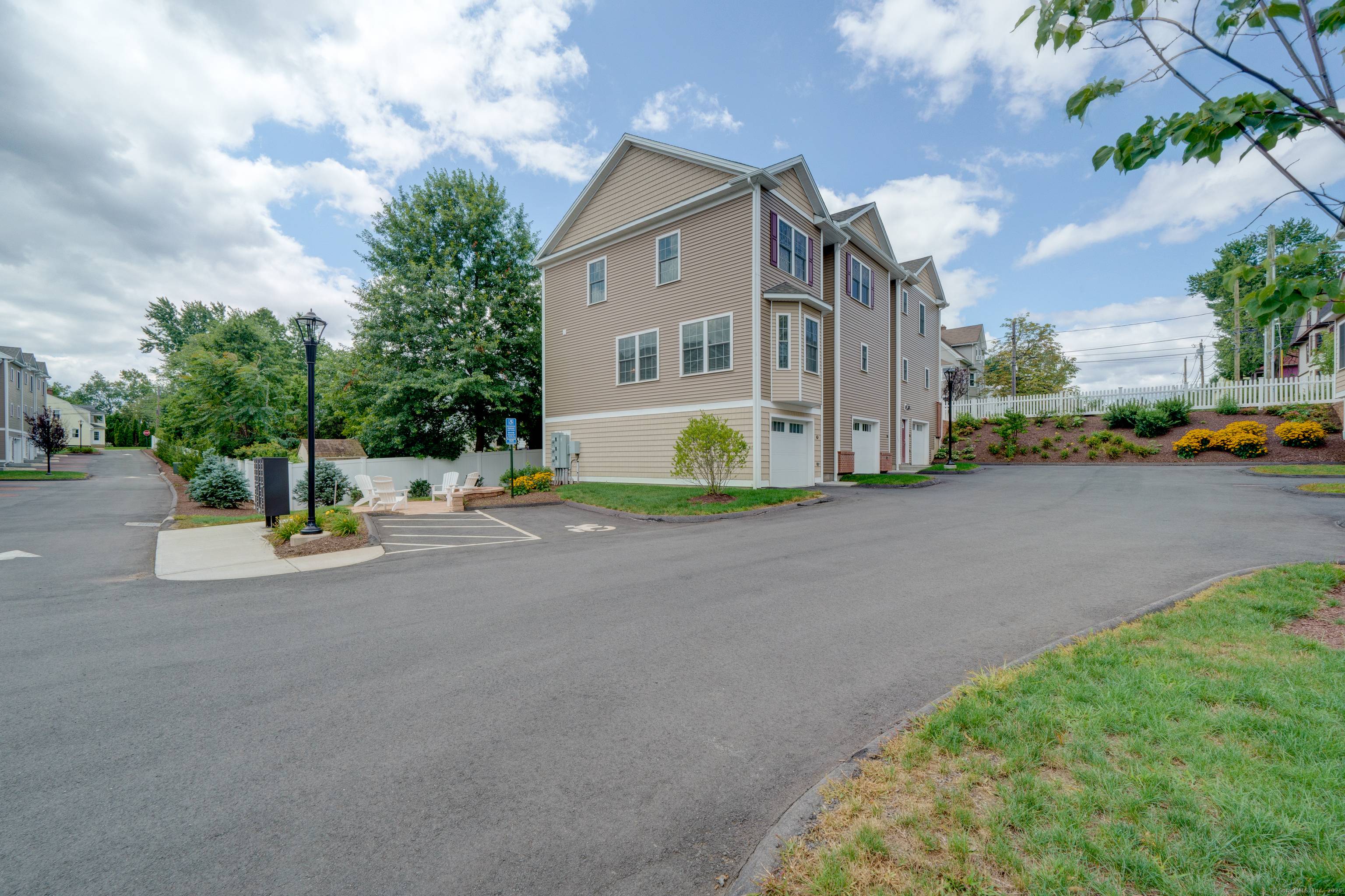 This spacious modern 3 bedroom, 2 full bathroom end unit offers everything you could want.