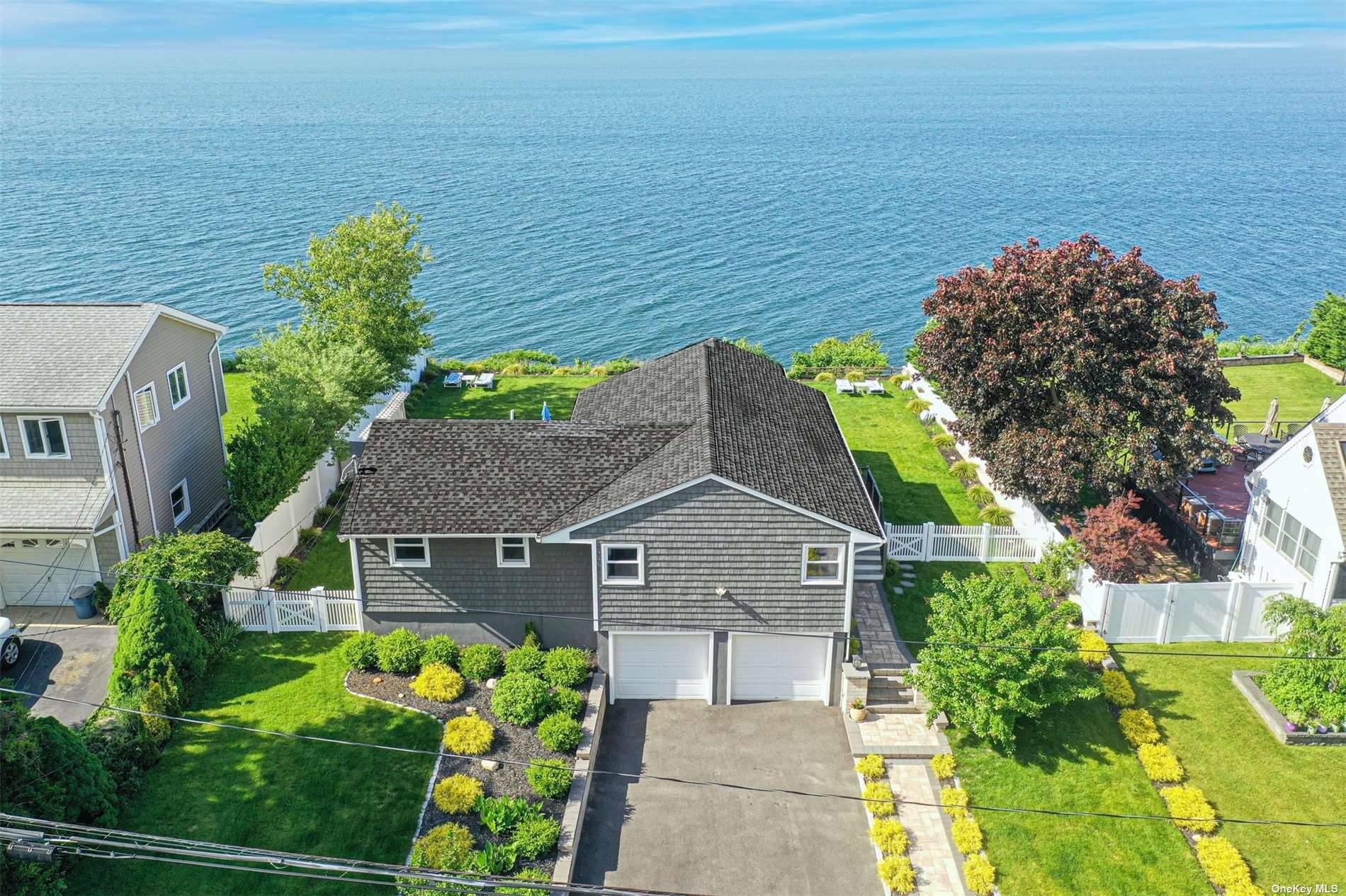 Welcome To 5 Seacliff Ave, nestled in the exclusive Miller Place Park community.
