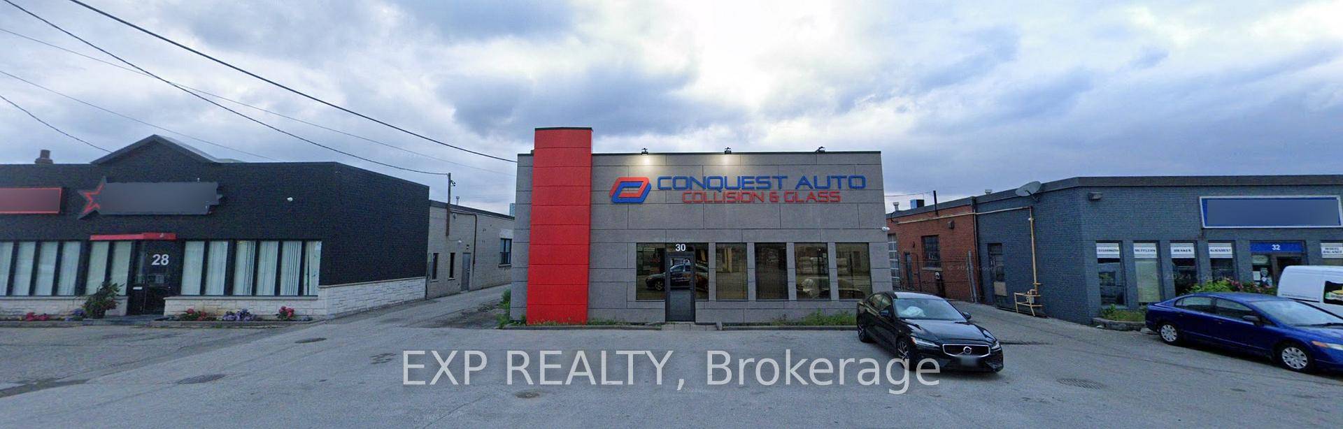 PREMIUM LOCATION 0. 42 acres, very well maintained, freestanding building and Auto Body Business combined for sale.