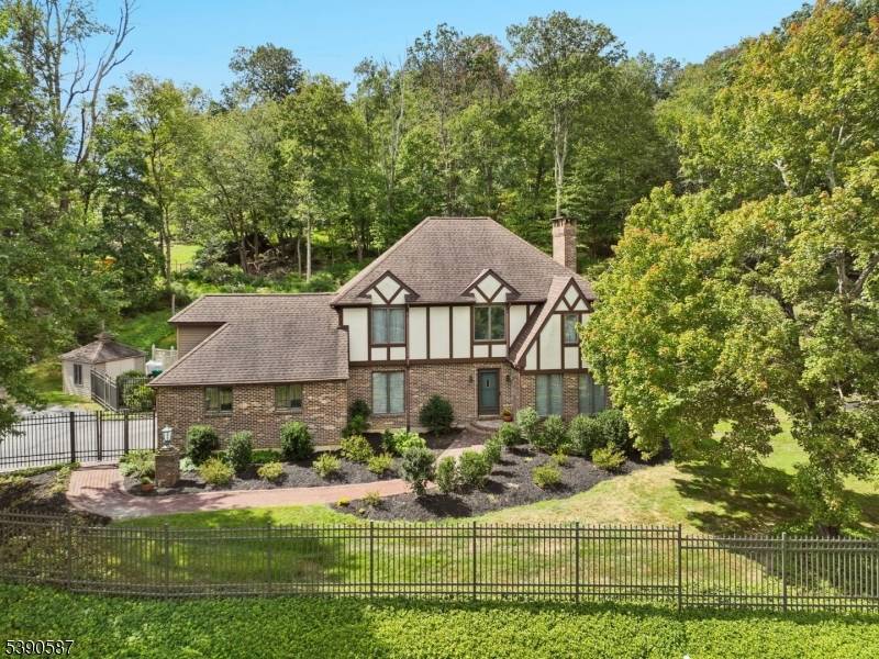 Welcome to this beautifully appointed colonial home, nestled in a serene setting with breathtaking countryside views.