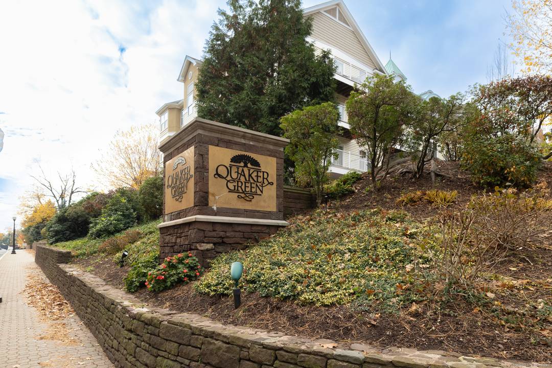 Sun filled, elegant end unit townhouse in sought after Quaker Green offers the perfect blend of modern luxury, privacy, and convenience.