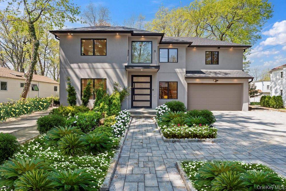 Welcome to this striking 5 bedroom, 4.