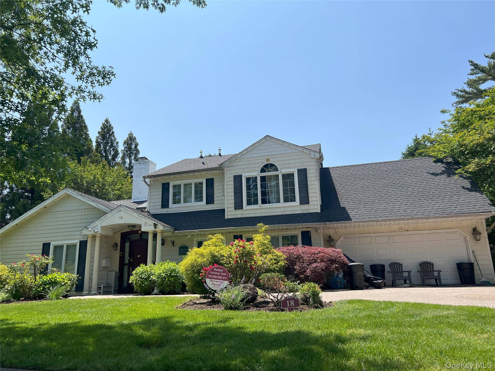 Welcome to 18 Sherwood Ln aka 14 Sherwood Ln, located in the highly sought after RCC community and zoned to the highly ranked East Williston School District.