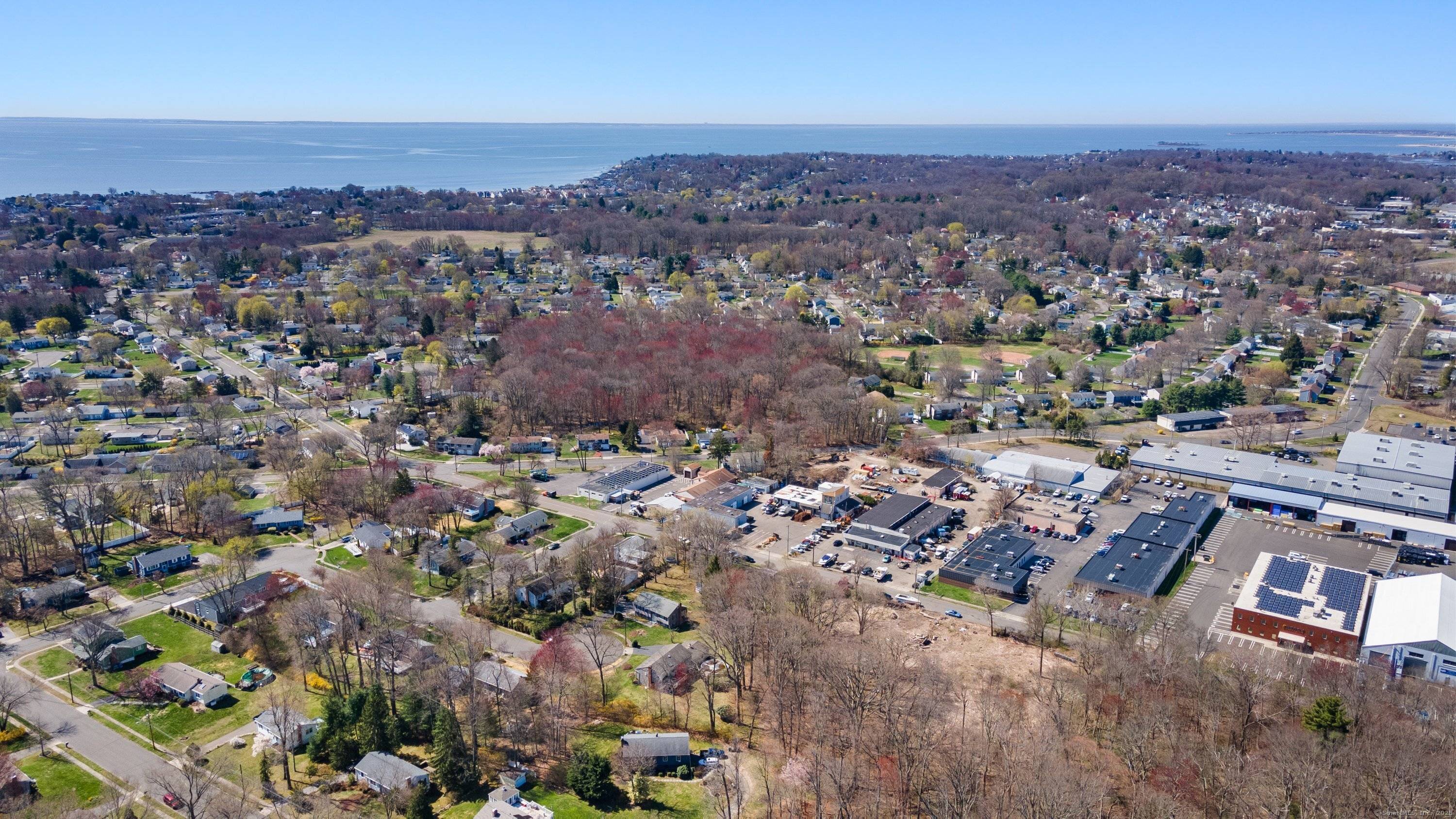 Incredible opportunity zoned LI, buildings with steel beam construction with oil heating on 1.