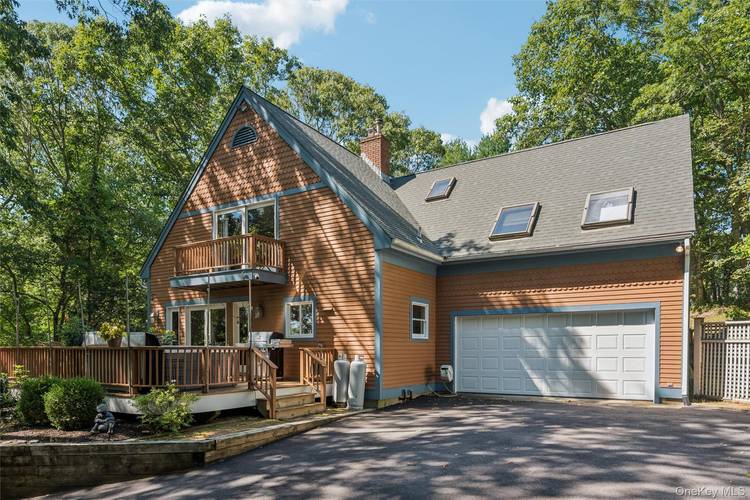 Enjoy the Sounds of Silence at this Hill Top Chalet Overlooking the North Fork's Mattituck Inlet.