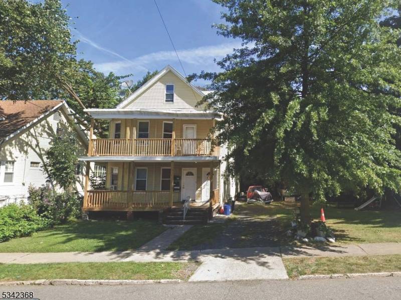 This spacious two family home features two generous 3 bedroom units on the first and second floors, plus a finished attic for extra space.
