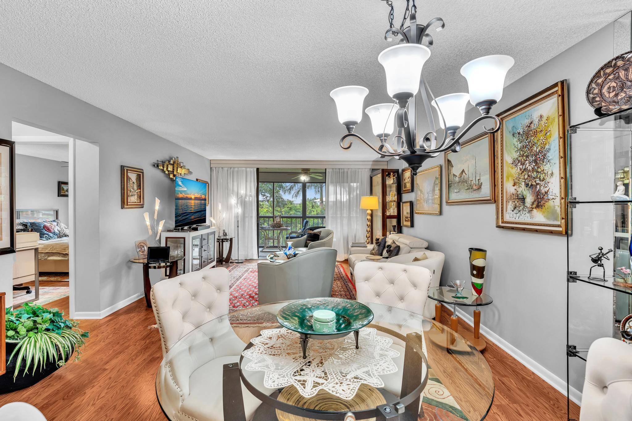 Come see this stunning condo in the highly desirable Boca Del Mar area in the prestigious 55 community of The Glens.