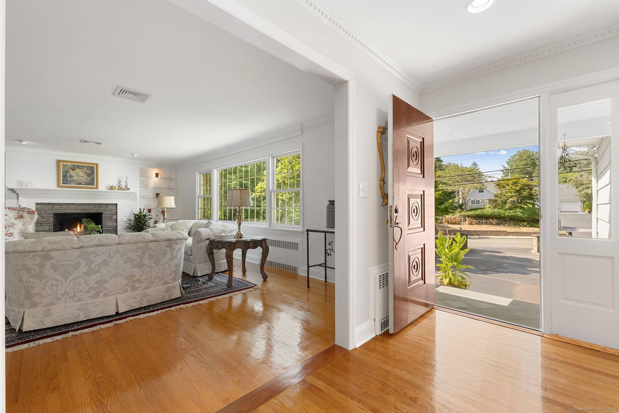 A quintessential New England Ranch set behind stone walls and a rounded driveway, this home welcomes you with timeless style and impressive scale.