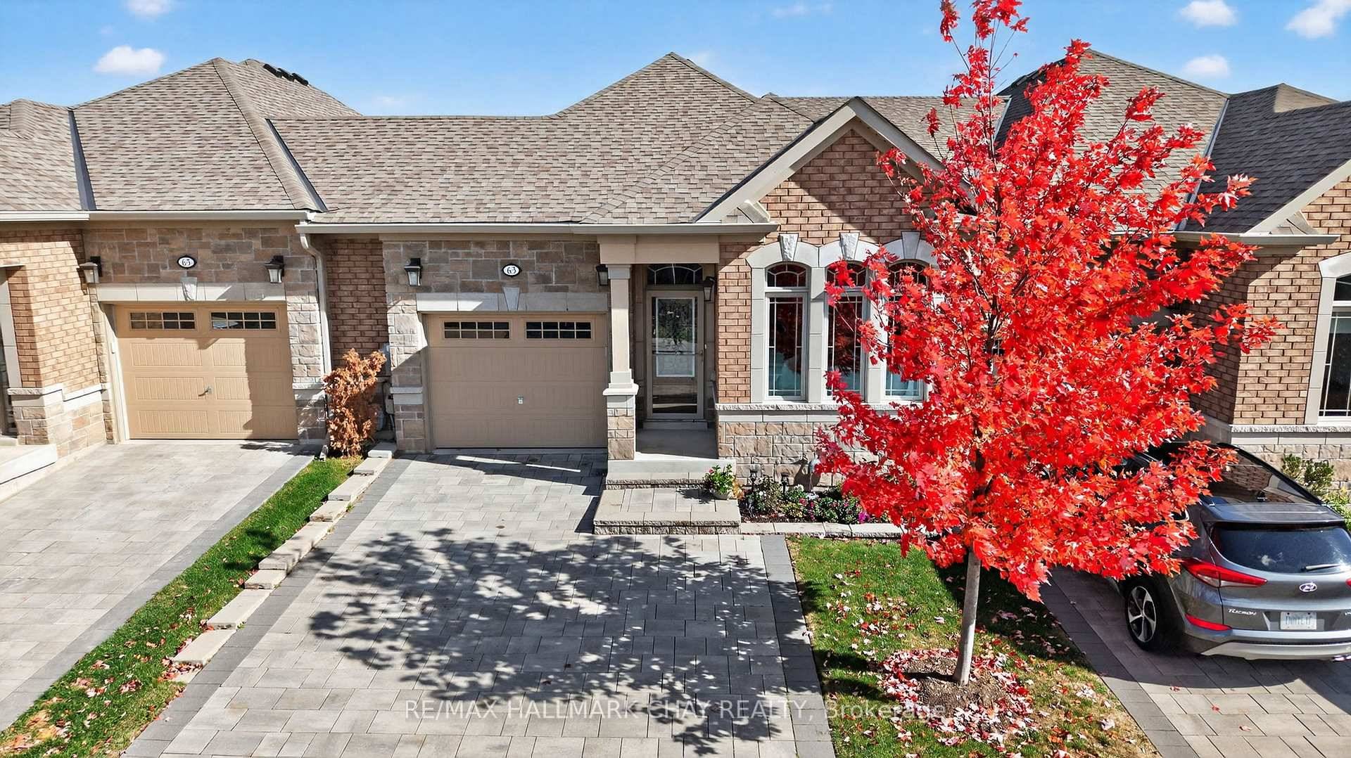 Stunning Bungalow Townhome in the luxurious adult lifestyle community of Briar Hill !