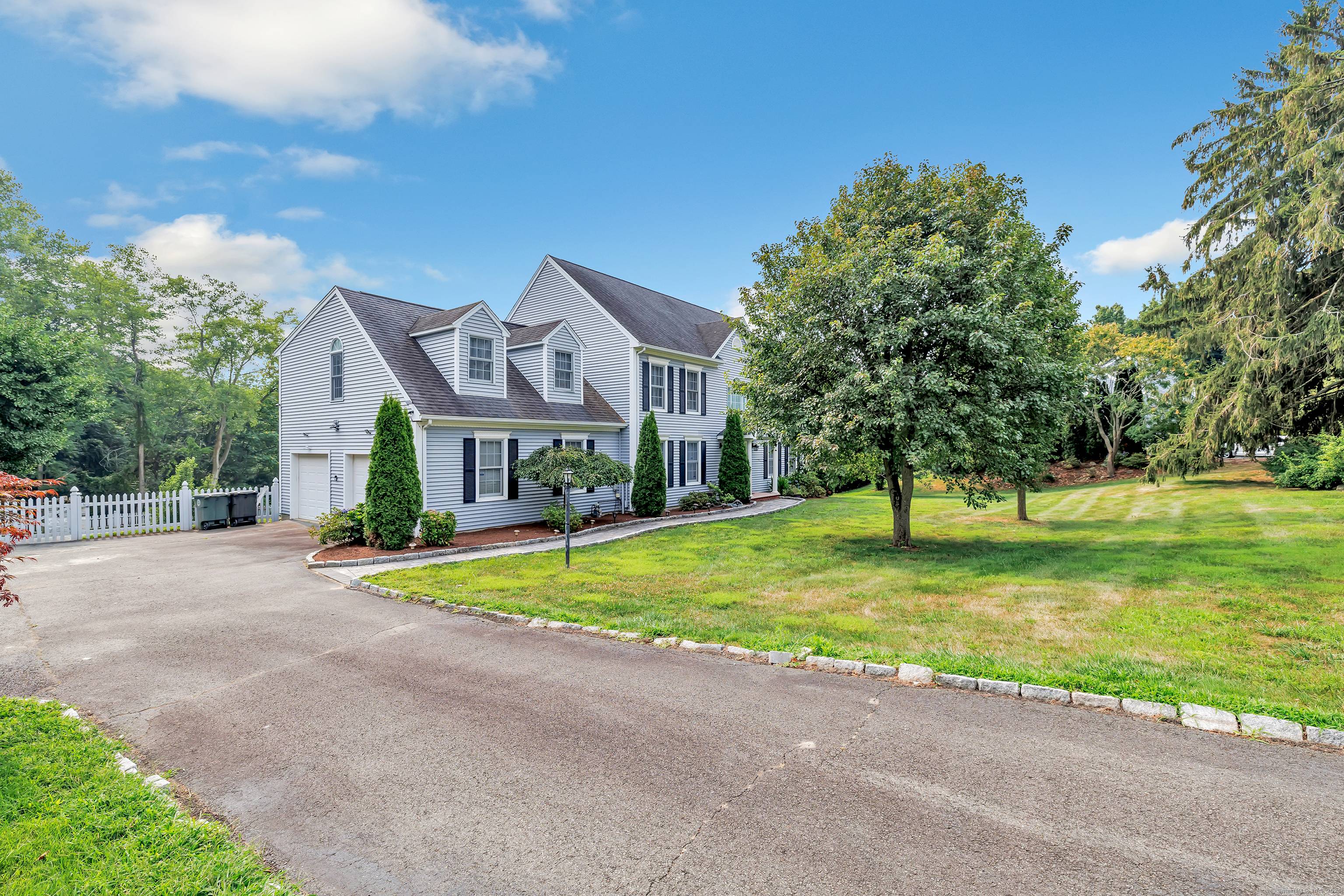 Welcome to this spacious and beautifully maintained Colonial located in a sought after area of Milford.