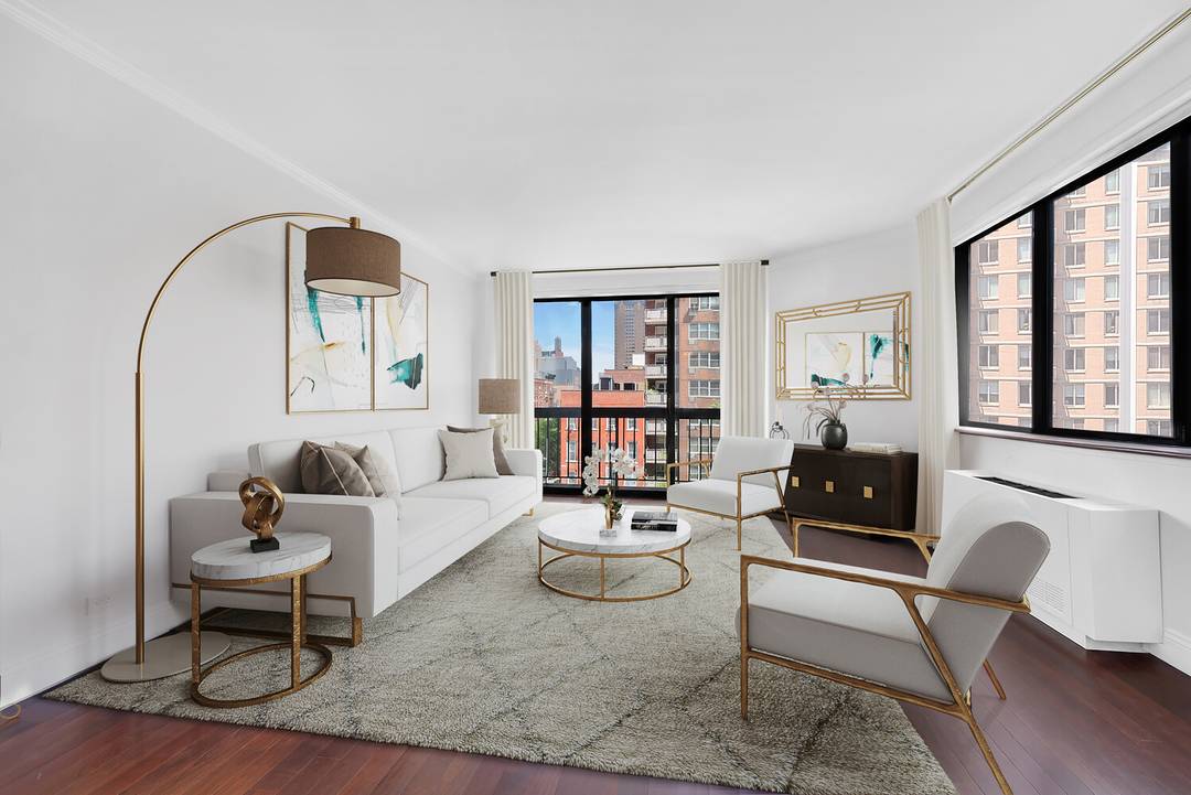 Extra Bright Two Bedroom, Two Bathroom Home with Private Balcony, Triple Exposures, and In Unit Bosch Washer and Dryer.