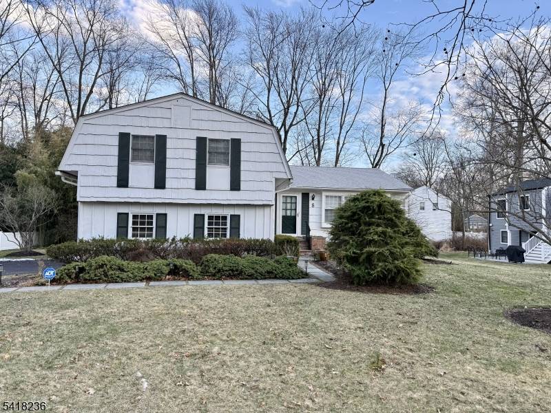 Welcome to 8 Johnston Drive in Morristown, NJ, a beautifully maintained 4 bedroom, 2.