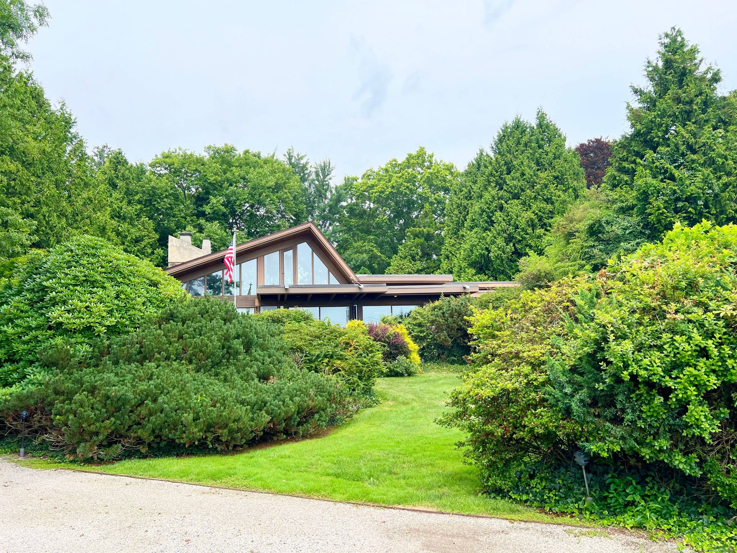 AMAZING WATERFRONT CUSTOM BUILT HOME WITH BEAUTIFUL POOL AND PRIVATE BEACH.