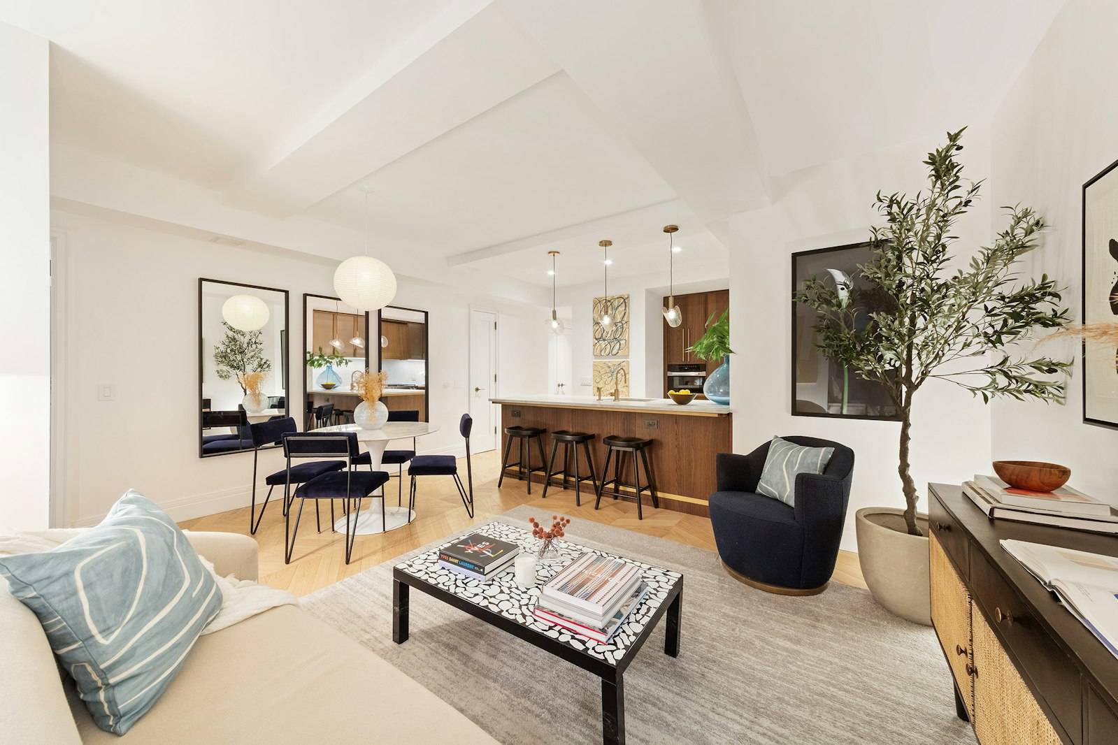 Residence 6F is a stunning one bedroom, one and a half bathroom featuring a generous foyer and expansive living dining room.