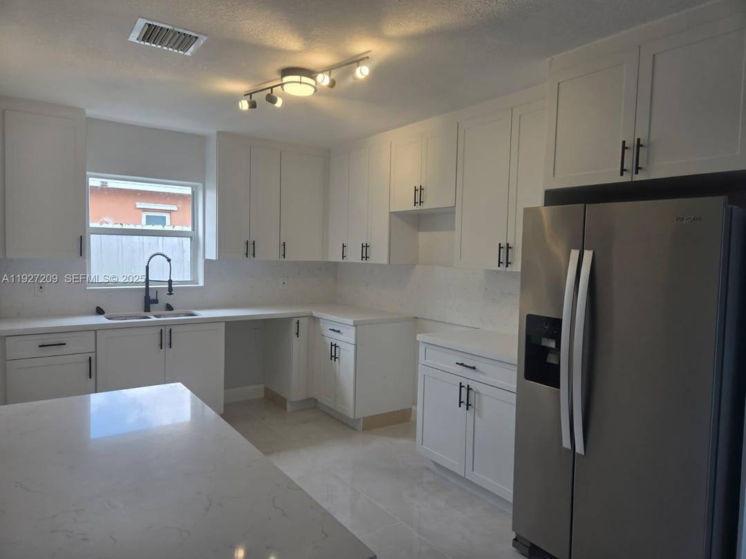 Completely remodeled 4 2 that has an efficiency which is perfect for in laws or to rent.