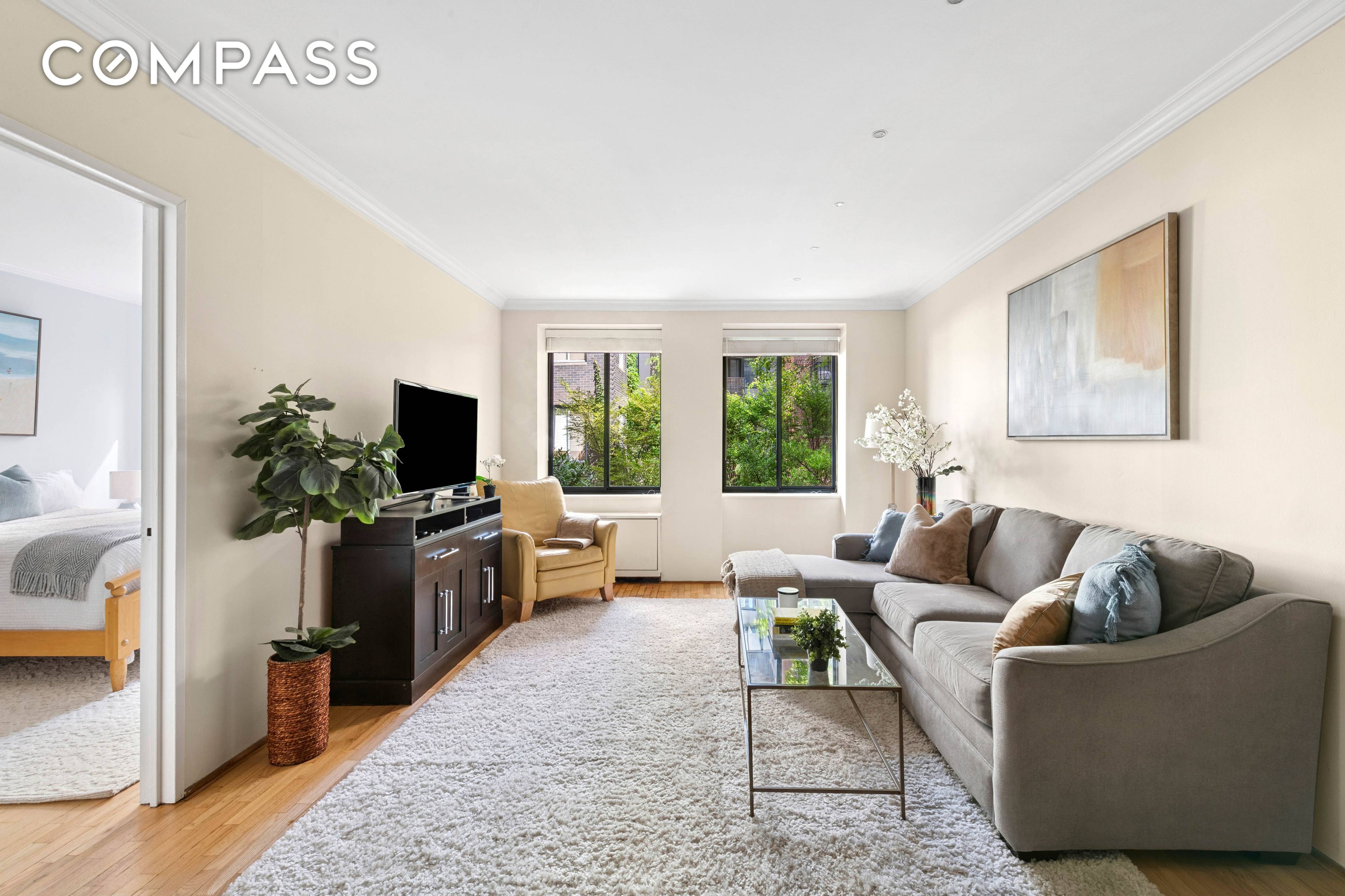 A Quiet Retreat on Perry Street Welcome to Residence 2H at 167 Perry Street a peaceful home overlooking a lush garden with leafy treetop views, offering a quiet retreat from ...
