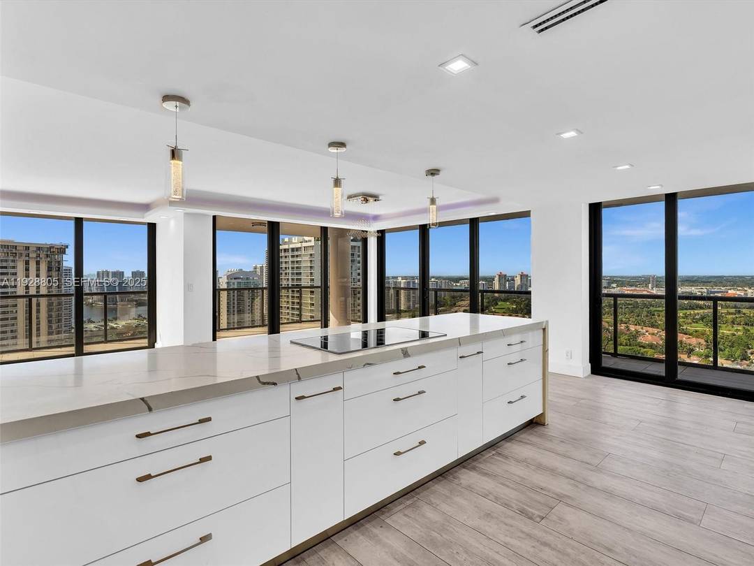 Beautifully renovated and oversized 2 bedroom, 2 bath corner residence with spectacular 360 views from sunrise to sunset.