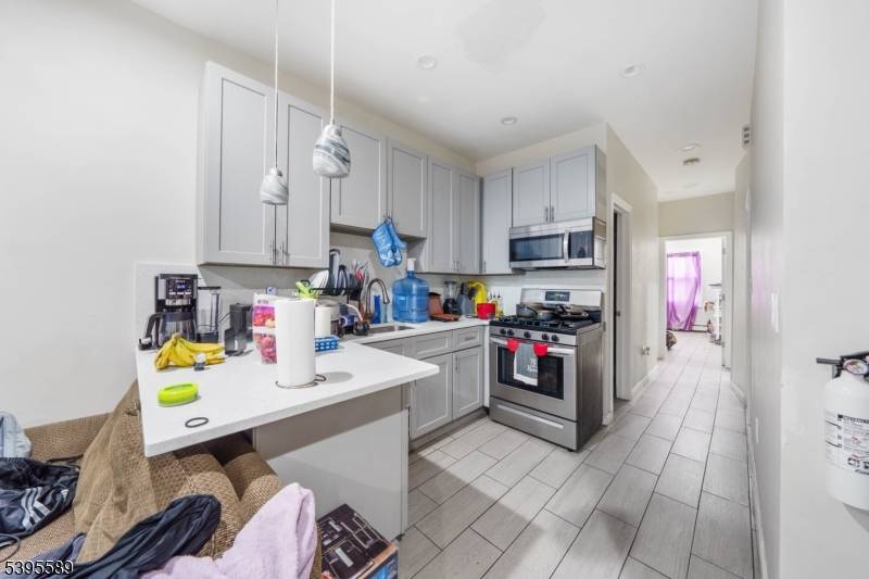 Well maintained 2 family home with an additional bonus rooms in the attic, offering great potential and flexibility.