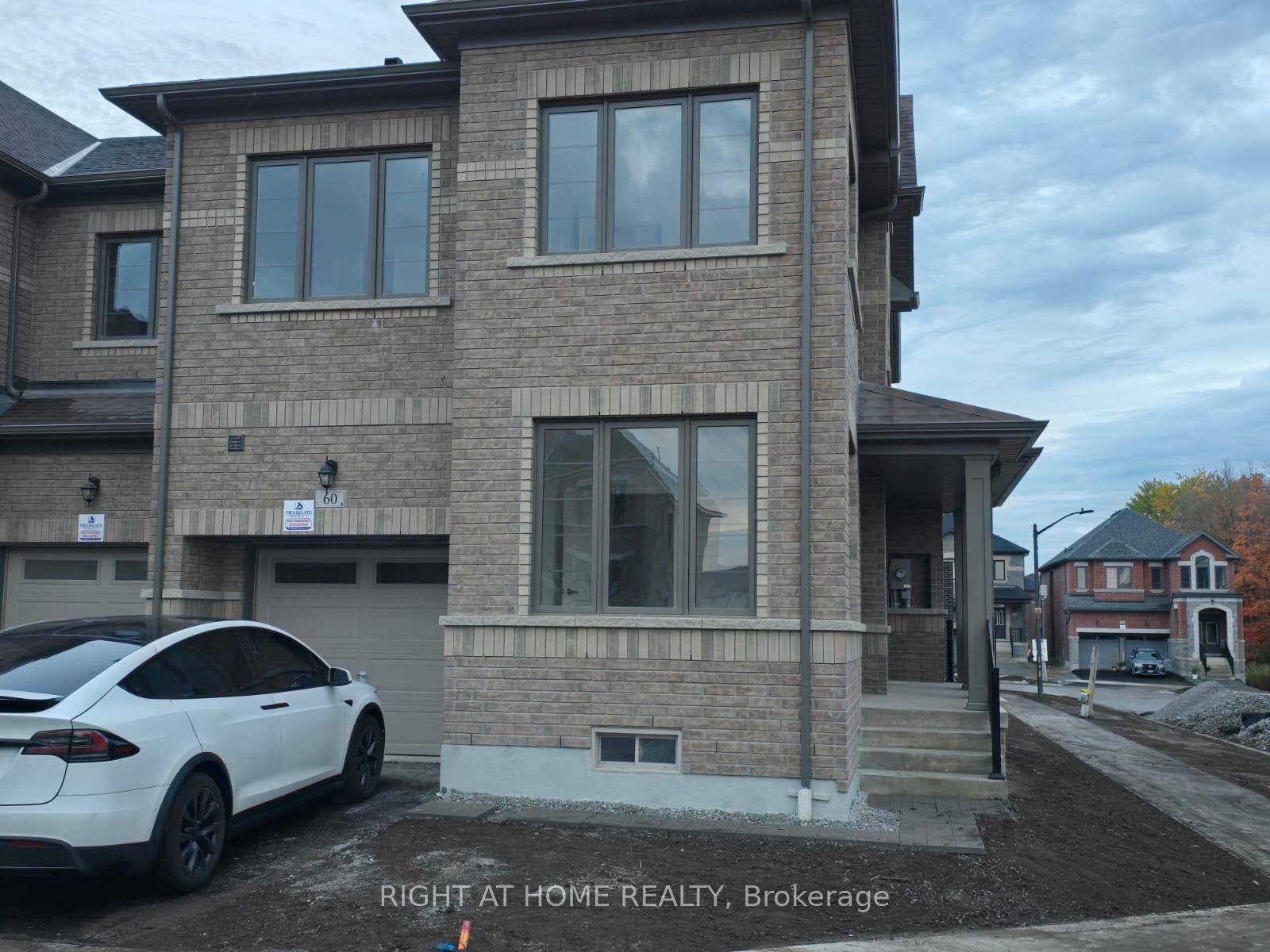 Welcome to this one of a kind corner lot townhouse in the heart of Whitby's newest community !