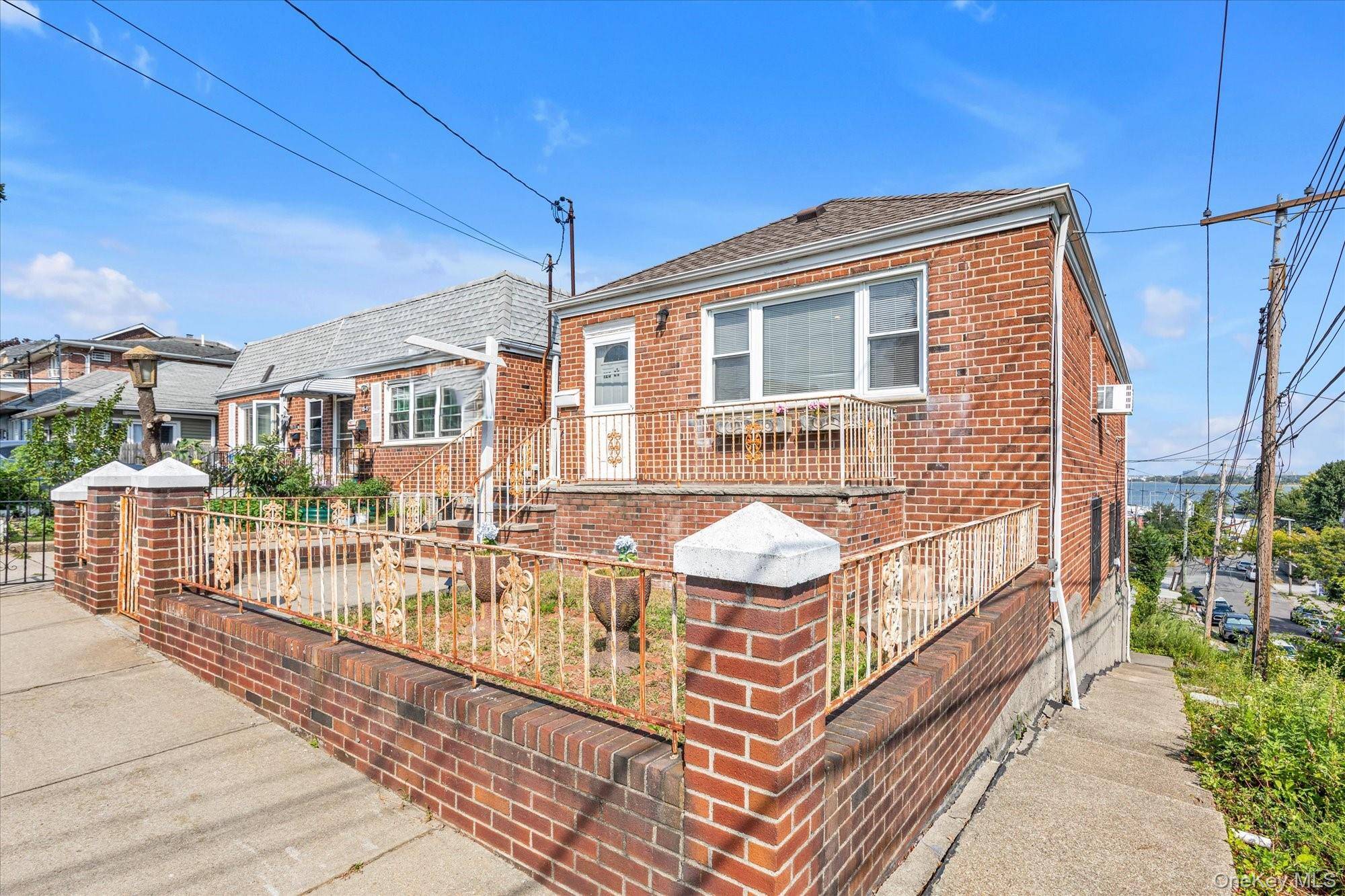 Welcome to This Brick Two Family House in College Point.