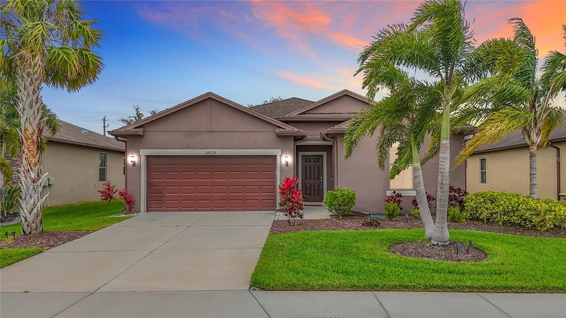 Welcome to 4808 111th Terrace E, Parrish, FL, a truly stunning, meticulously maintained single family residence nestled in the sought after Harrison Ranch community.
