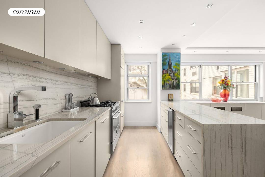 Brilliantly gut renovated, amazingly spacious incomparable one bedroom home with unique, large office den guest room with 2 large closets offers loft like scale and breathtaking garden views on a ...