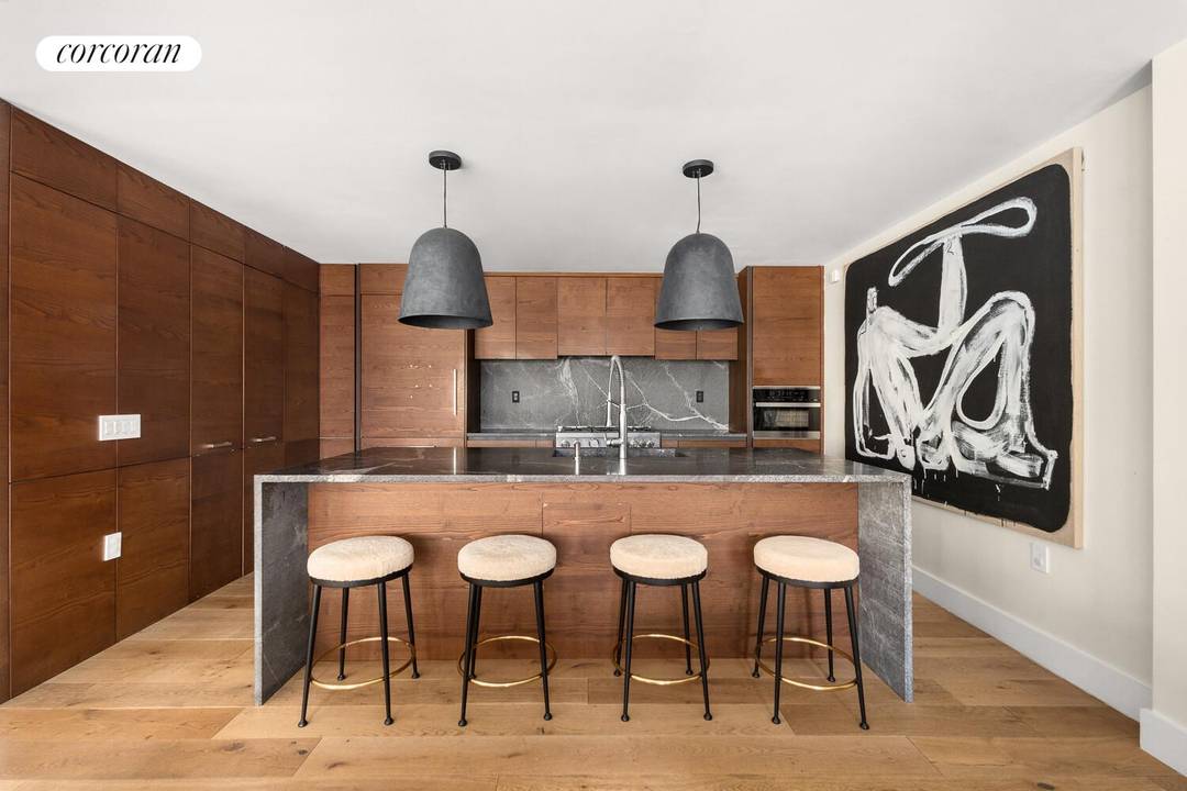 Welcome to the townhouse residence at 585 Union Avenue, a thoughtfully designed duplex spanning the first and second floors of a boutique condominium in the heart of Williamsburg.