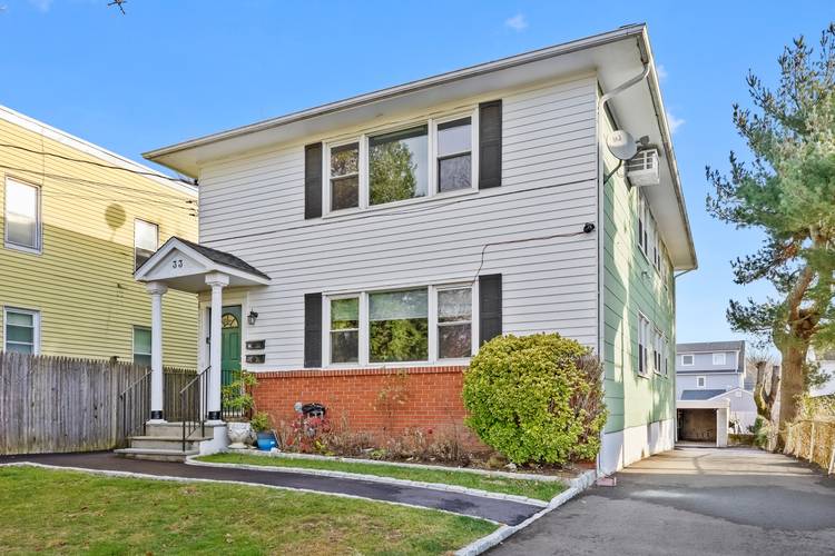 Exceptional multi family with 2 vacant spacious three bed one bath units that are only a heartbeat away from Stamford's most active beach.