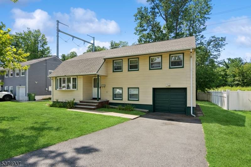 Discover this beautifully maintained 4 bedroom, 2 1 2 bath home nestled on a quiet, tree lined street in one of Roselle's most desirable neighborhoods with schools in walking distance.